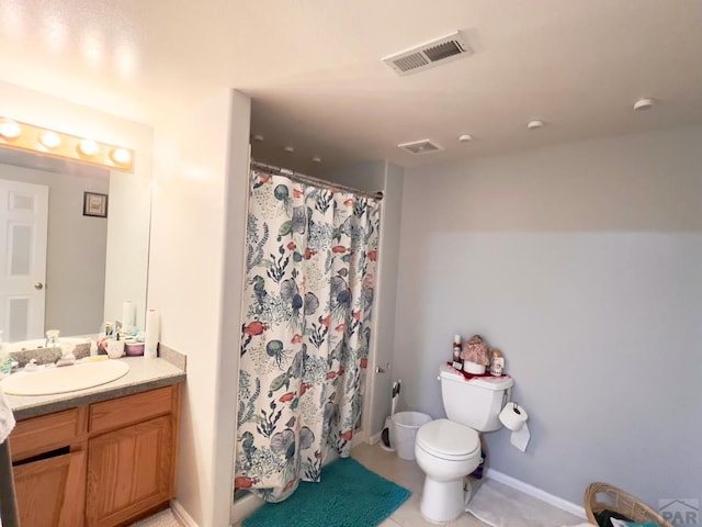 bathroom with visible vents, a shower with shower curtain, toilet, tile patterned flooring, and vanity