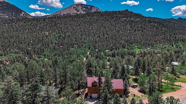 mountain view featuring a wooded view