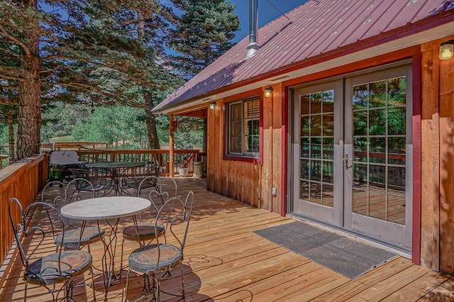 wooden terrace featuring french doors