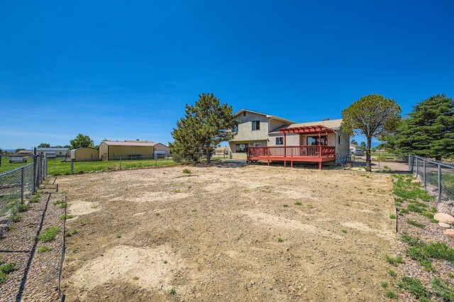 950 S Los Charros Dr, Pueblo West, CO 81007 - view of yard with a wooden deck