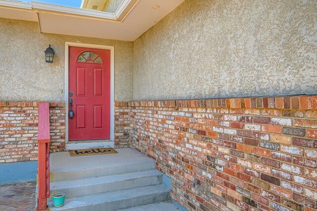 950 S Los Charros Dr, Pueblo West, CO 81007 - doorway to property featuring stucco siding
