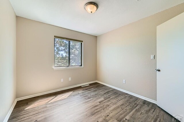 950 S Los Charros Dr, Pueblo West, CO 81007 - unfurnished room featuring wood finished floors