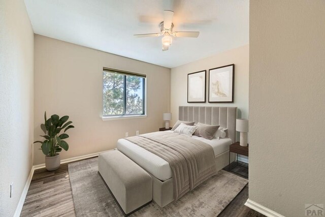 950 S Los Charros Dr, Pueblo West, CO 81007 - bedroom featuring wood finished floors and ceiling fan