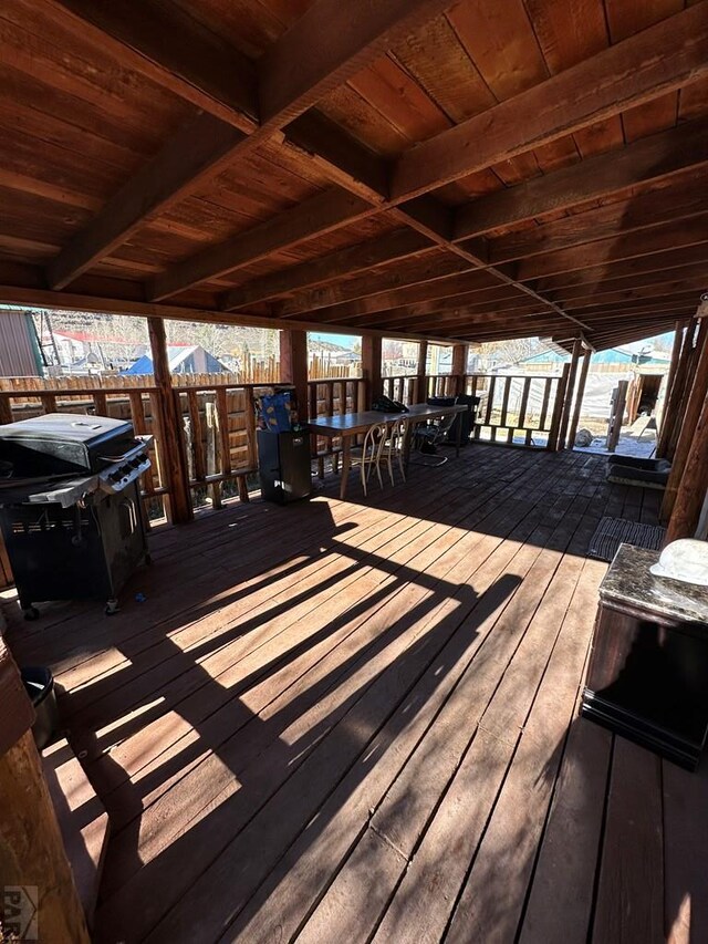 deck with outdoor dining space