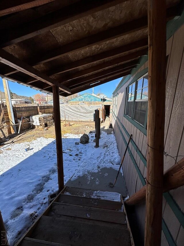 view of patio / terrace featuring a fenced backyard and a mountain view