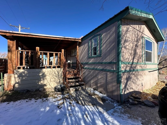 view of snow covered property