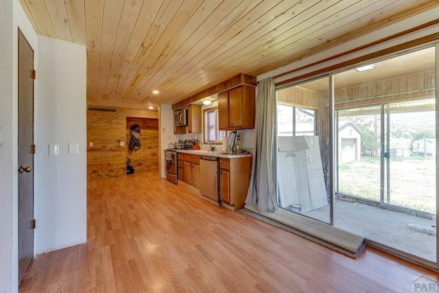 kitchen with wooden ceiling, light wood-style flooring, light countertops, appliances with stainless steel finishes, and brown cabinets