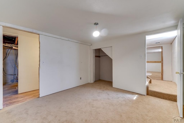 unfurnished bedroom featuring carpet flooring