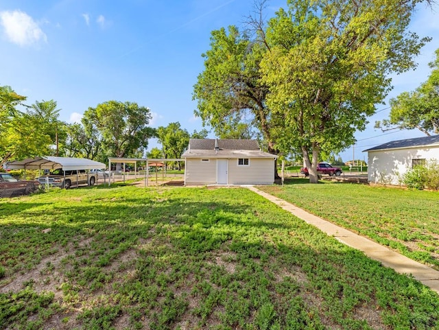 1415 E 2nd St, Pueblo, CO 81001 - view of yard with a carport