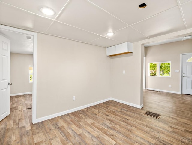 1415 E 2nd St, Pueblo, CO 81001 - below grade area with baseboards and light wood finished floors