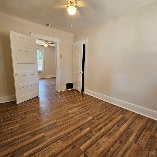 1938 E 6th St, Pueblo, CO 81001 - unfurnished room with ceiling fan and dark wood-type flooring