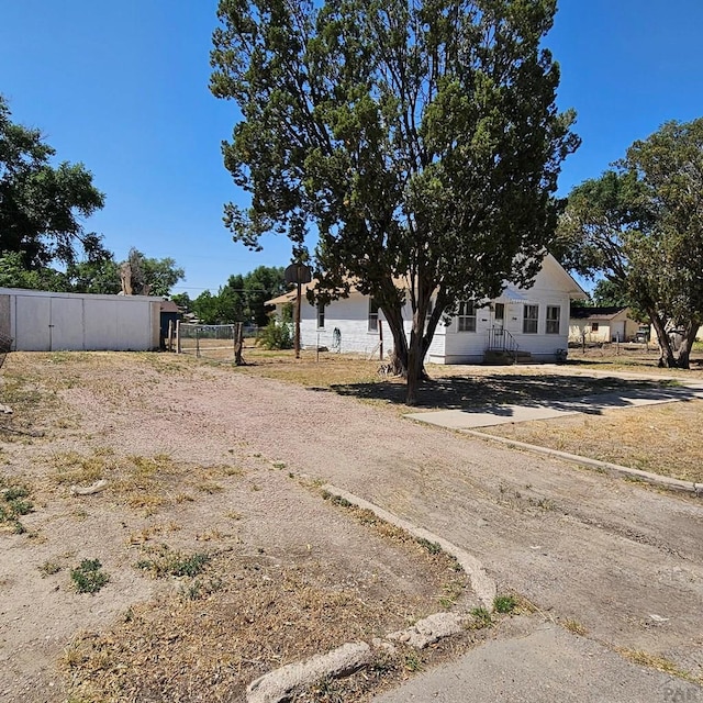 1938 E 6th St, Pueblo, CO 81001 - view of yard with dirt driveway