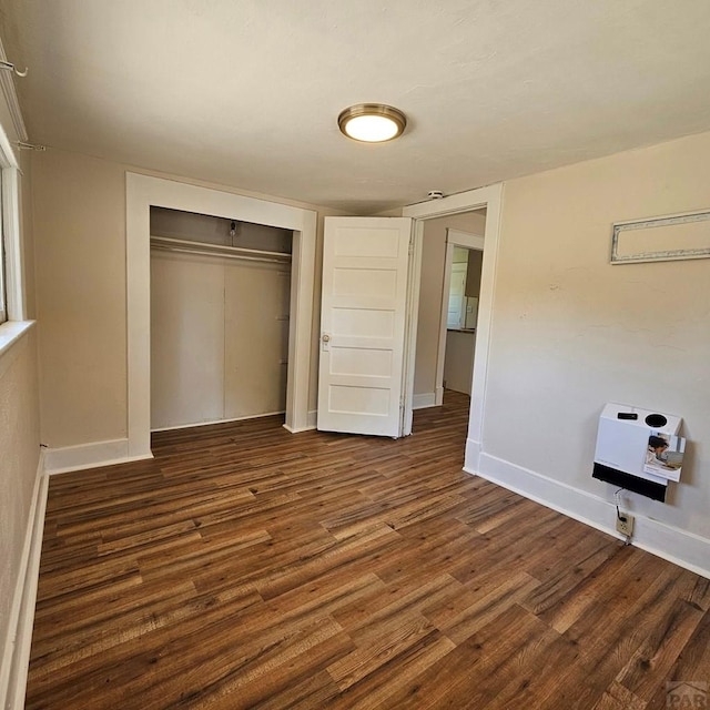 1938 E 6th St, Pueblo, CO 81001 - unfurnished bedroom featuring dark wood finished floors and a closet