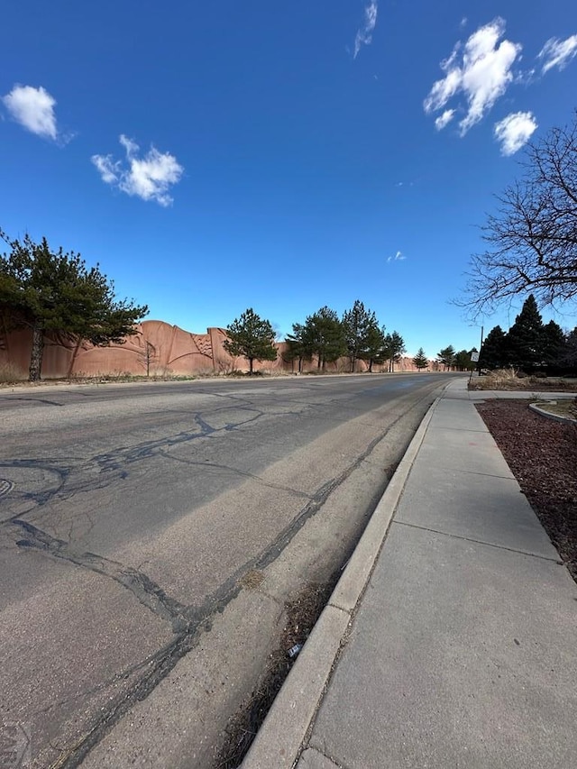 146 Montebello Rd, Pueblo, CO 81001 - view of asphalt street with sidewalks and curbs