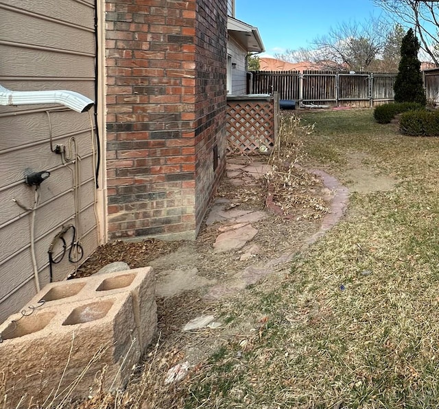 view of yard with fence