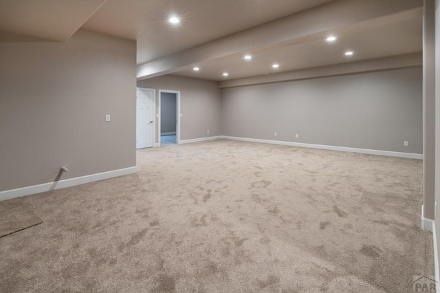finished below grade area with recessed lighting, baseboards, and carpet floors
