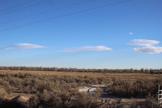 view of landscape with a rural view