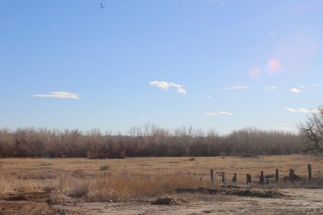 view of local wilderness with a rural view