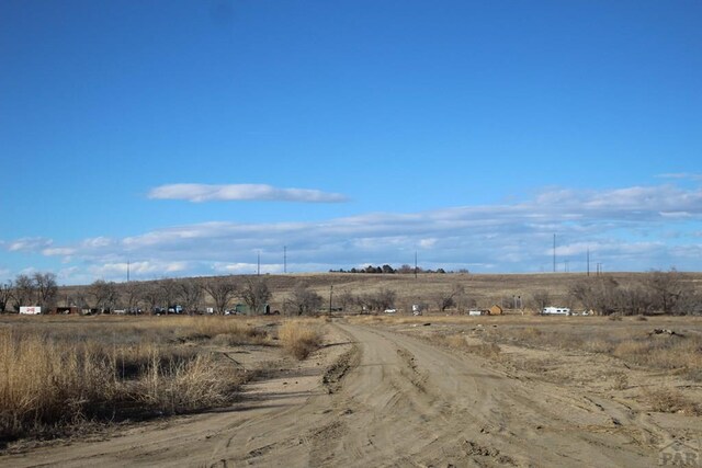 view of street featuring a rural view