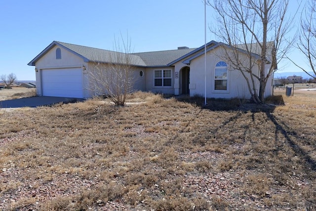 ranch-style house with a garage