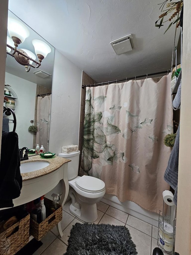 full bathroom featuring visible vents, curtained shower, toilet, tile patterned floors, and vanity