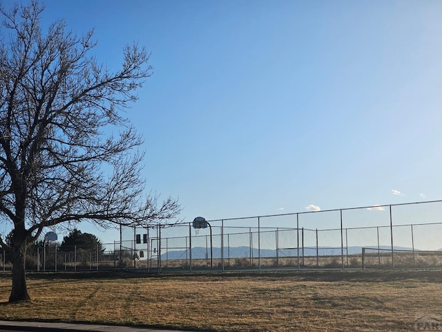 view of property's community with fence