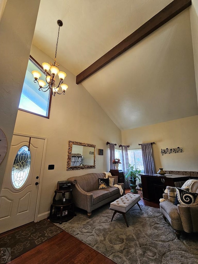 living area featuring beam ceiling, a notable chandelier, high vaulted ceiling, and wood finished floors