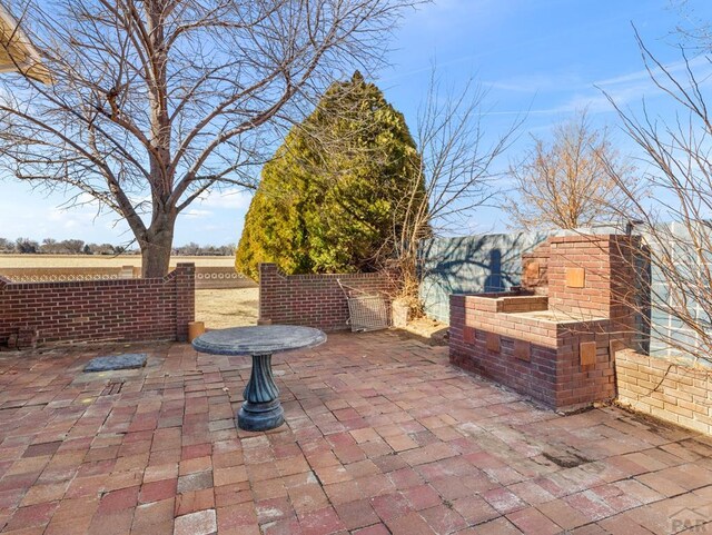 view of patio / terrace with fence