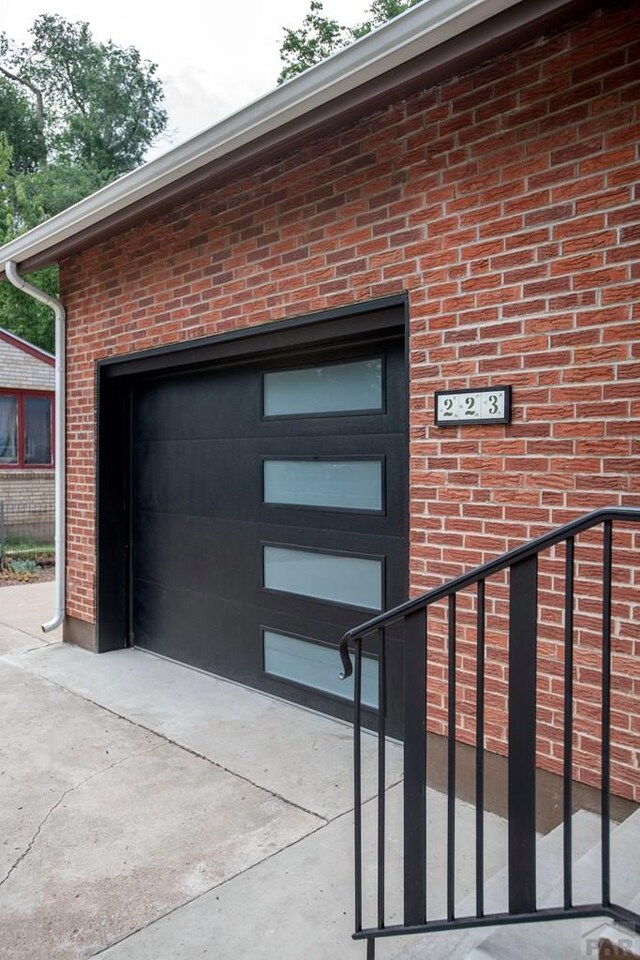 garage featuring driveway