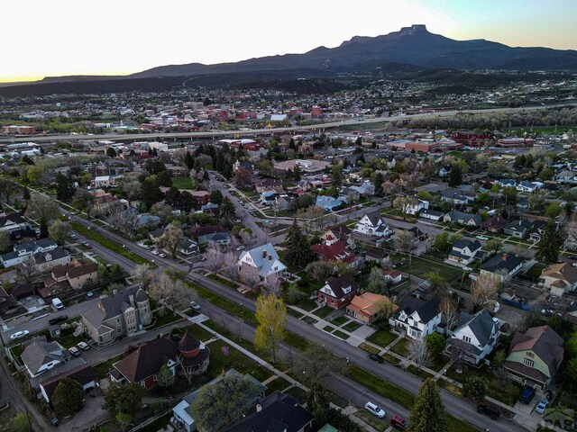 drone / aerial view with a residential view and a mountain view