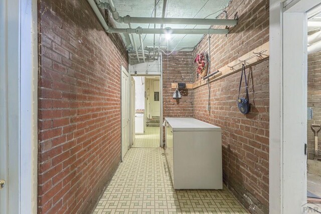 corridor with brick wall