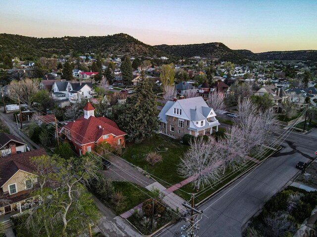 aerial view at dusk with a residential view