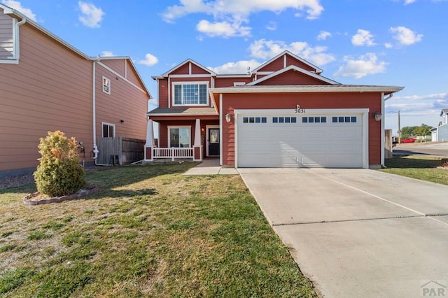 view of front facade featuring covered porch, driveway, an attached garage, and a front yard