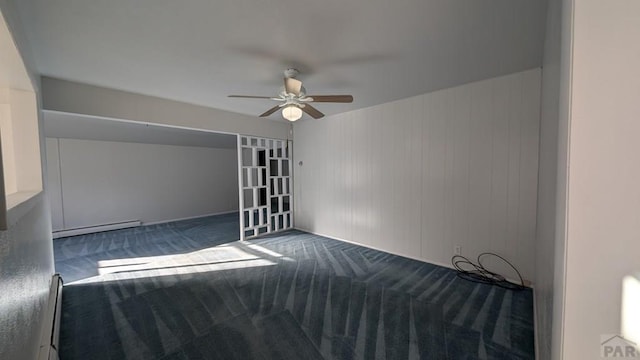 232 Saddle Rd, Trinidad, CO 81082 - empty room with carpet flooring, a baseboard radiator, and a ceiling fan