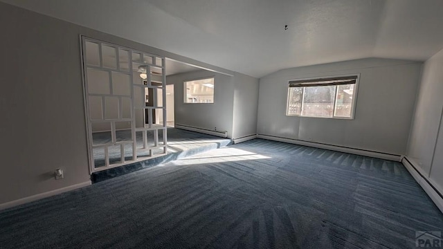 232 Saddle Rd, Trinidad, CO 81082 - empty room featuring carpet flooring, lofted ceiling, baseboard heating, and baseboards