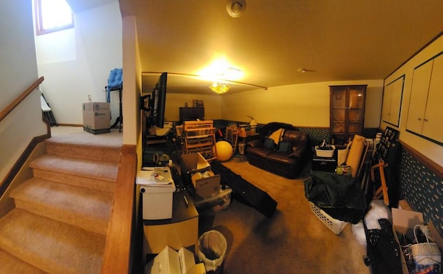 home theater room featuring light colored carpet