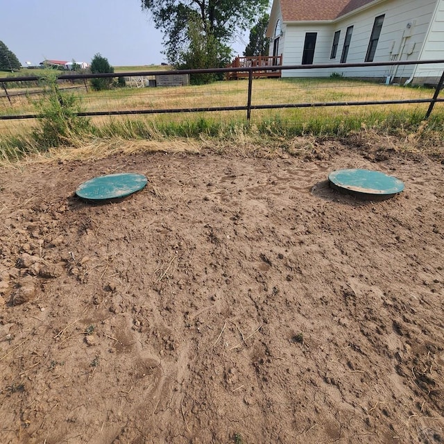 surrounding community featuring fence