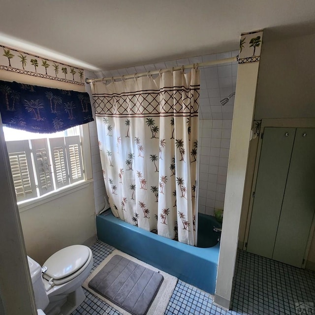 full bathroom featuring toilet, shower / bathtub combination with curtain, and tile patterned flooring