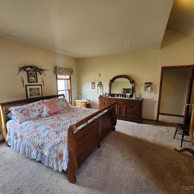 bedroom with light colored carpet