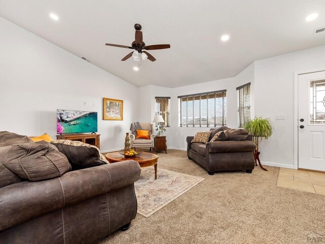 living area featuring light carpet, recessed lighting, visible vents, and lofted ceiling