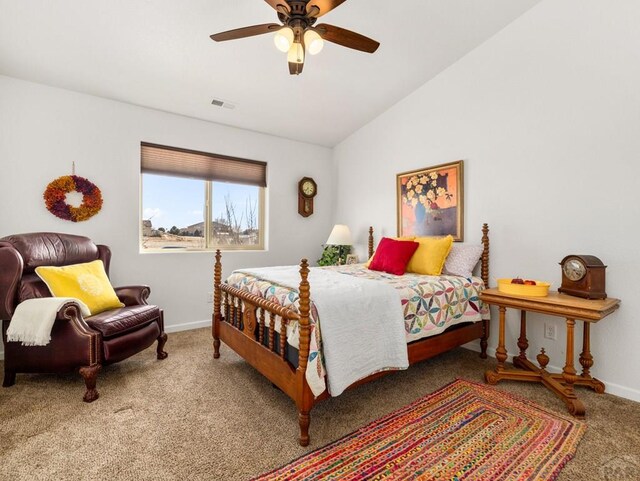 bedroom with baseboards, visible vents, a ceiling fan, vaulted ceiling, and carpet flooring