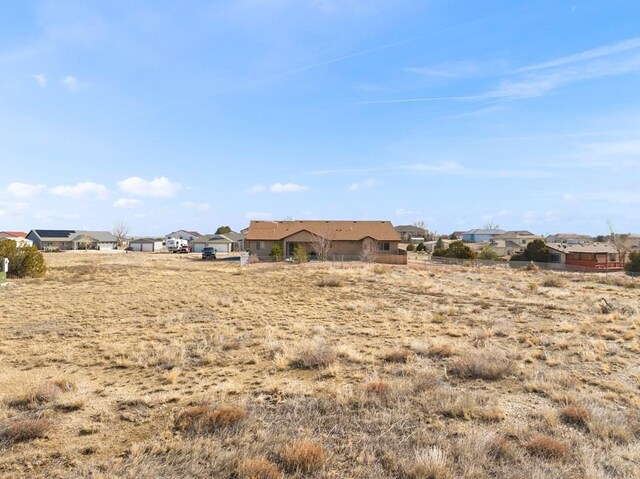 view of yard featuring a residential view