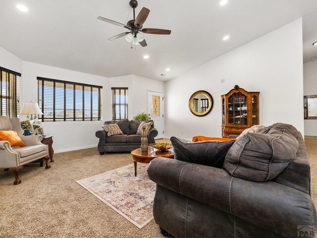 living room with baseboards, lofted ceiling, ceiling fan, carpet floors, and recessed lighting