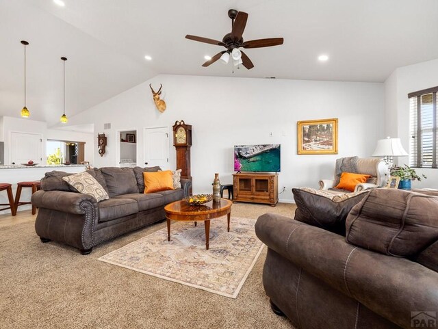 living room with ceiling fan, light colored carpet, vaulted ceiling, and recessed lighting