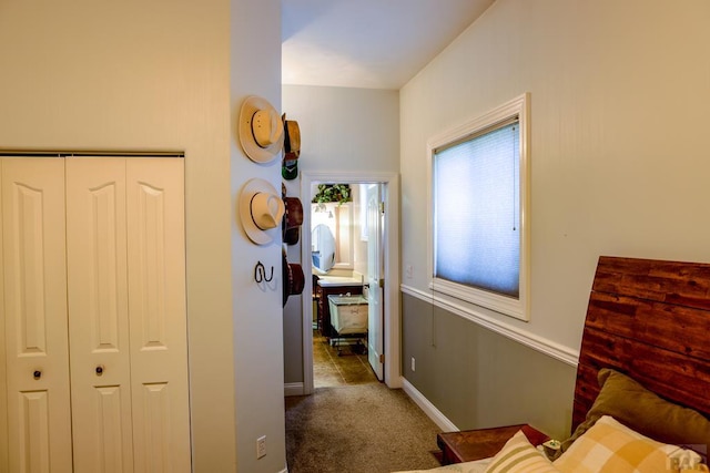 709 Cimarron Ave, La Junta, CO 81050 - corridor featuring carpet flooring and baseboards