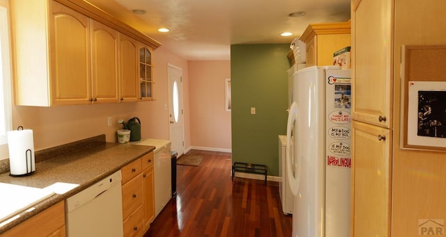 709 Cimarron Ave, La Junta, CO 81050 - kitchen featuring refrigerator, white dishwasher, dark wood-style floors, glass insert cabinets, and recessed lighting