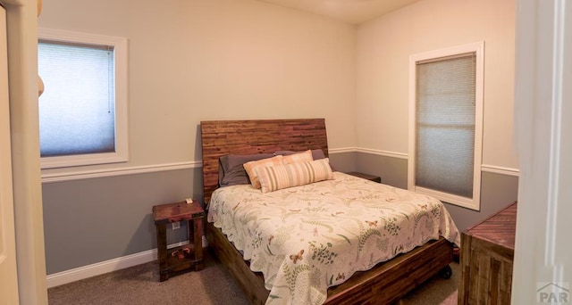 709 Cimarron Ave, La Junta, CO 81050 - bedroom with carpet flooring and baseboards