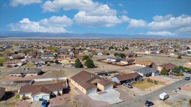 aerial view featuring a residential view and a mountain view