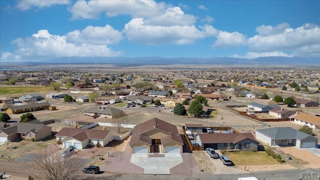 bird's eye view featuring a residential view and a mountain view