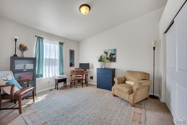 living area with carpet floors and baseboards